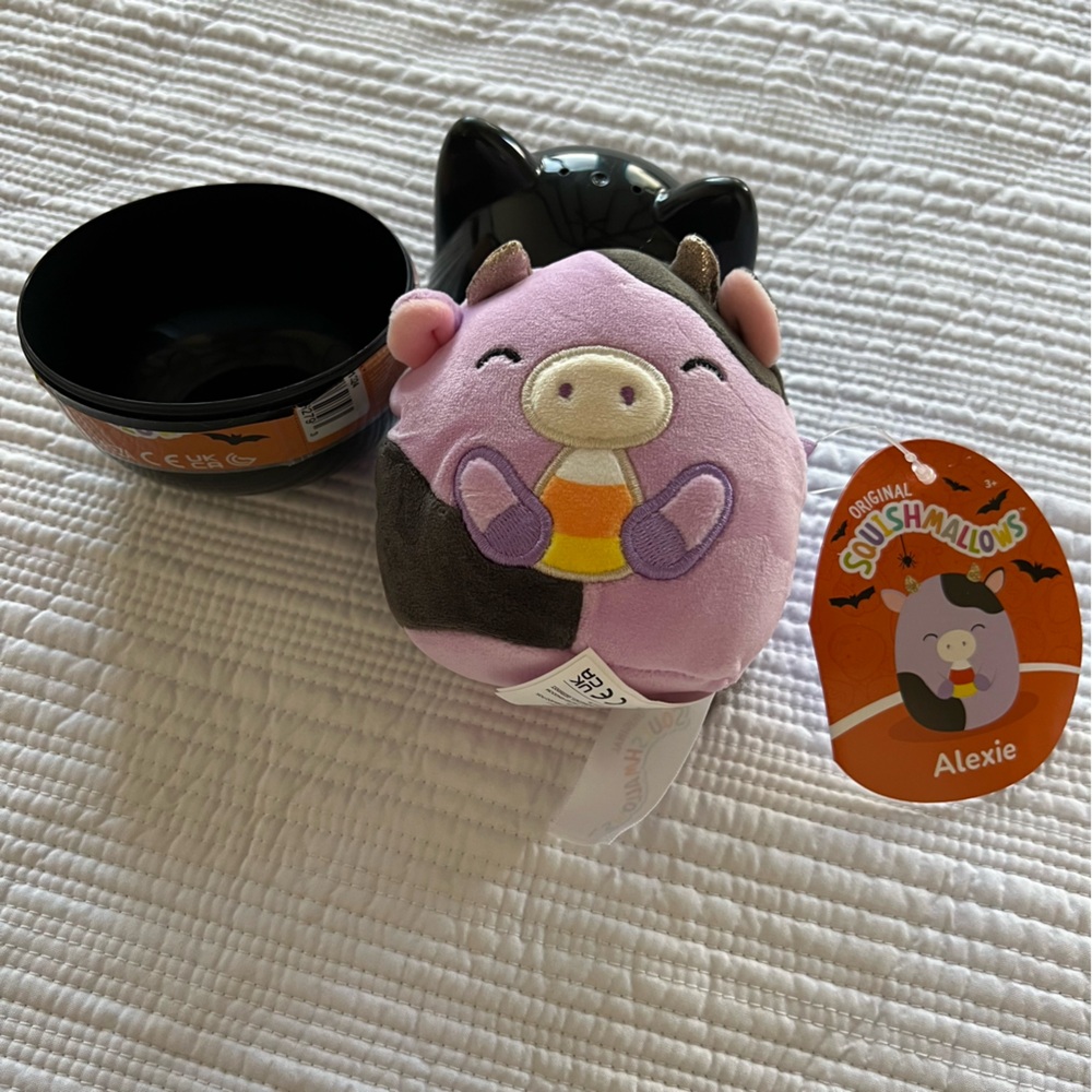 NWT Original Squishmallows Mystery Squad 4” Alexie the Purple Cow with Candycorn
